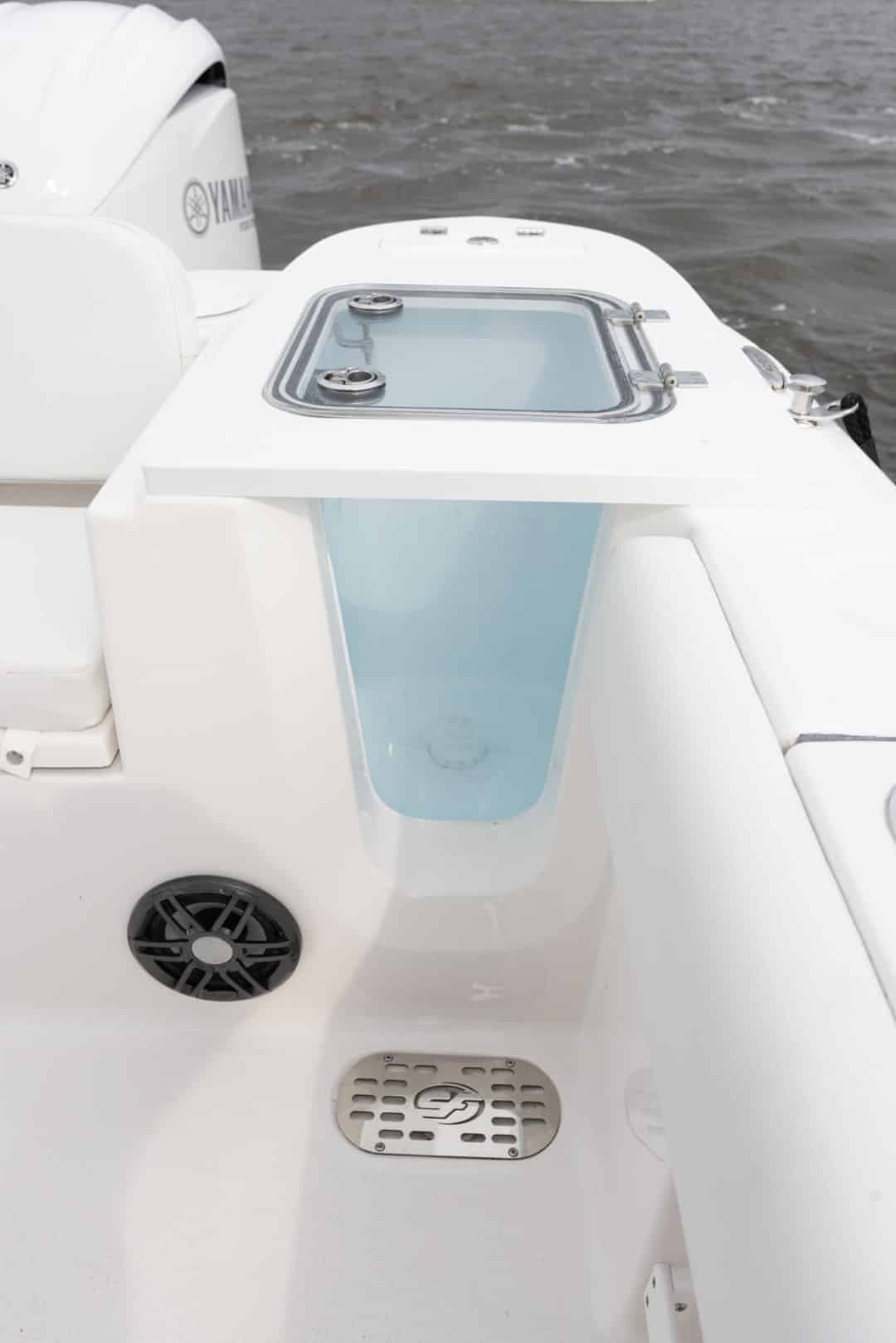 Sea Fox 248 Commander well with aquarium wall