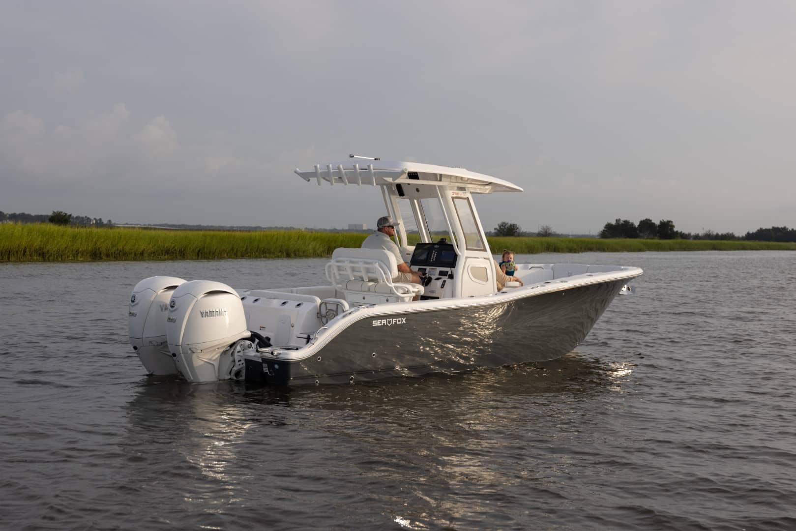 Sea Fox 268 Commander side view on the water slow speed