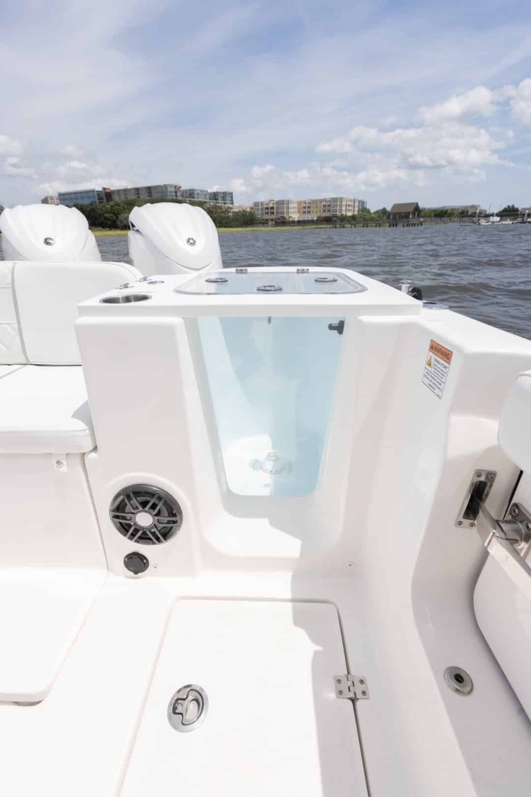 Sea Fox 268 Commander well with aquarium wall